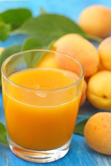 Apricot juice and ripe fresh apricots