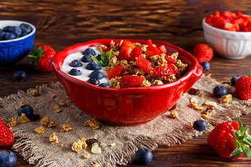 Homemade granola Breakfast with yogurt and fresh fruit berries. concepts health food