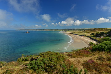 St.Ouen's Bay, Jersey, U.K.   Wide angle headland vista of a beach in the Summer.