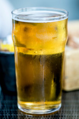 Pint Glass of Light Beer or Lager on a Table