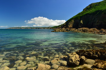 Petit Plemont, Jersey, U.K.  Wide angle image of secluded bay in the Summer.