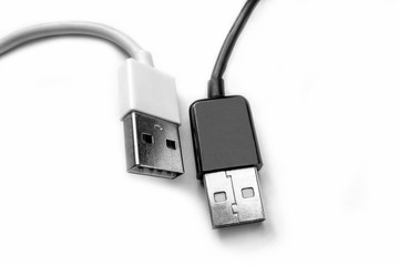 Black and white USB connectors. Computer peripheral connectors for connecting devices. Computer technology and equipment for the transmission of information.