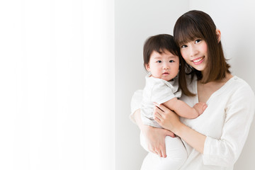 portrait of asian mother and baby