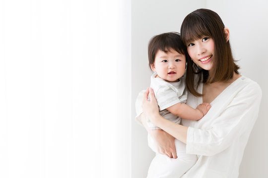 portrait of asian mother and baby