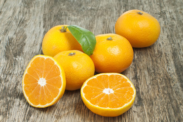 mandarin fruit on a wooden table