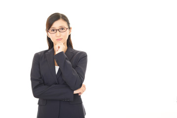 悩むビジネスウーマン