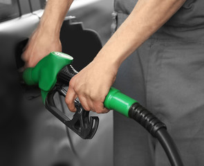Car refueling on petrol station