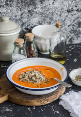 Pumpkin soup with quinoa and seeds. Healthy vegetarian food. Rustic style