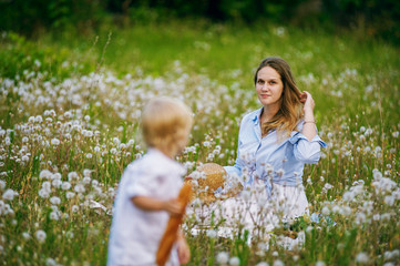 Mother with children in the Park on a picnic