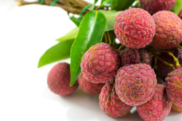 Fresh lychees on white background.