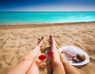 woman legs, coconut, Cosmopolitan cocktail