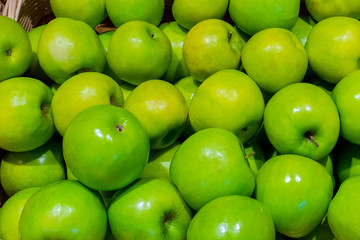 Green apples in the basket