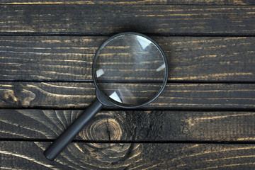 Magnifying glass on table