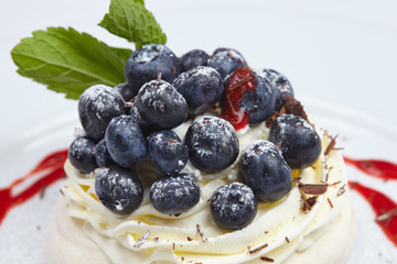 Meringue cake Pavlova with blueberry