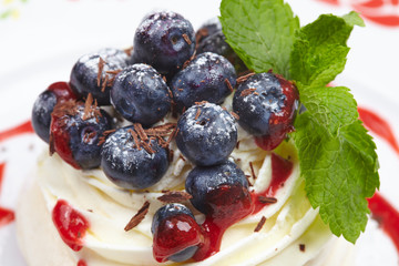 Meringue cake Pavlova with blueberry