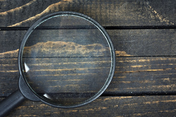 Magnifying glass on table