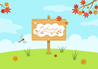 Autumn wooden sign on a grass with maple leaves and dragonfly. 