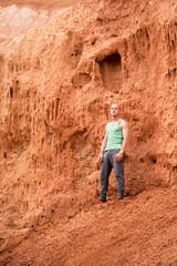 man on  background of Red Mountain