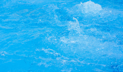 Bright blue water in a pool