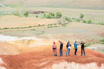 group of people taking pictures  Red Mountain