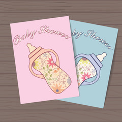 Set of baby showers with bottles on wooden background