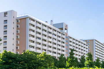 Apartment building in Japan, against blue sky