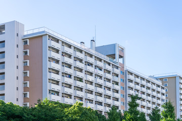 Apartment building in Japan, against blue sky