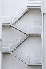 White stairs of a building for emergencies.