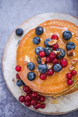 pancakes with redcurrant and berries