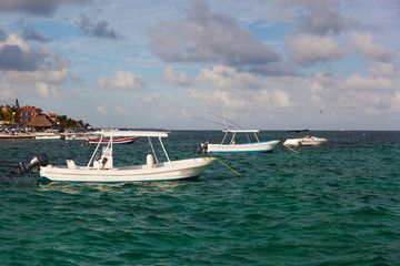 Fishing motor boats moored at caribbean sea