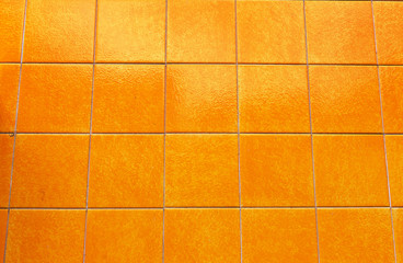Yelloe tile on the building's exterior in streets, Portugal
