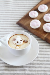 Coffee in white mug with melted cat shaped marshmallow & cat paw shaped marshmallows