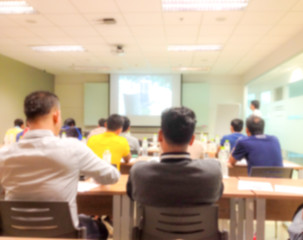 Blur background Speaker talk at seminar meeting room.
