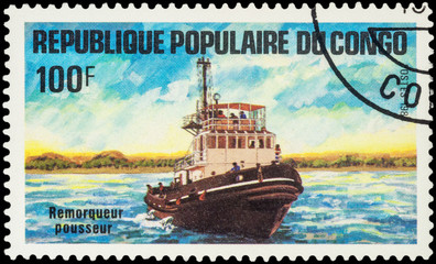 Pusher tug on postage stamp