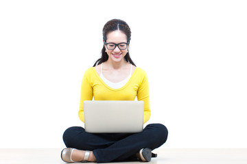 Happy woman using a laptop computer 