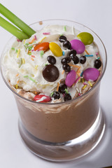 Chocolate and coffee latte beverages with whipped cream