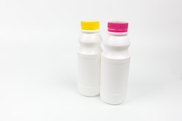Two Glass bottle of milk with isolated on a white background.