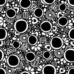 Seamless vector decorative hand drawn pattern. Black and white ethnic endless background with ornamental decorative elements with traditional motives, geometric figures, dots and flowers.