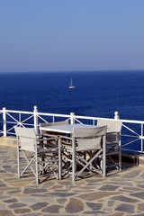 Terrace of white color on the background of ocean.