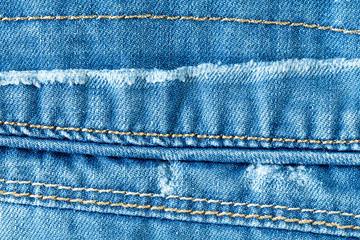 Blue jeans texture with seams