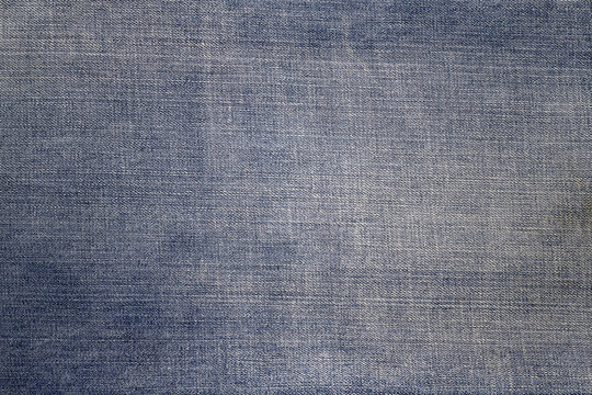 Texture of blue jeans textile background