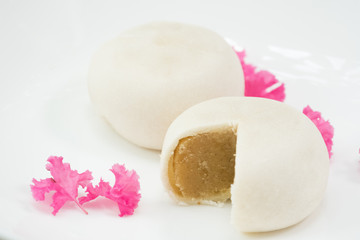 Traditional Chinese cake Breaded on white ceramics plate.