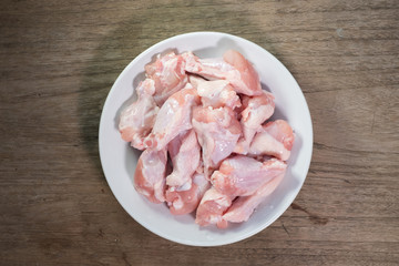 Raw chicken wings in a bow prepare for cooking.