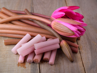 lotus stem on wooden background
