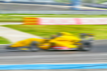 HDR car racing on the road and track with motion blur and Radial