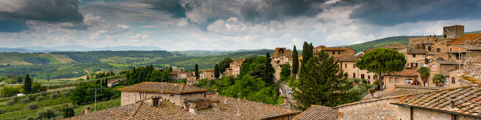 Over the rooftops of San Giminano. Panoramic view from the medieval town with part of the city and...