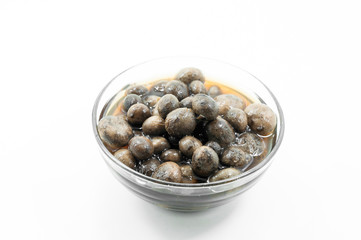 Thai puff ball mushroom soup in glass bowl on white background,Barometer Earthstars ,Food of northern Thailand