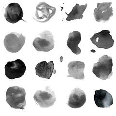 illustration of a set of watercolor spots of black and gray colors.