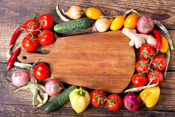 empty wooden board with vegetables for cooking