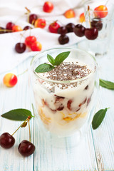 Dessert with cherry, yogurt, corn flakes